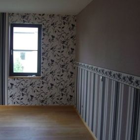 Raum mit gemusterter Tapete Andreas Schubbel Renovierungsservice